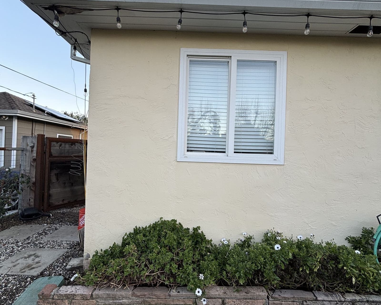 Clean stucco exterior wall after professional house washing